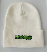 Solid white beanie with cuff. 4 Top-Seam Knit. 100% Acrylic. Knitted. One size fits most.